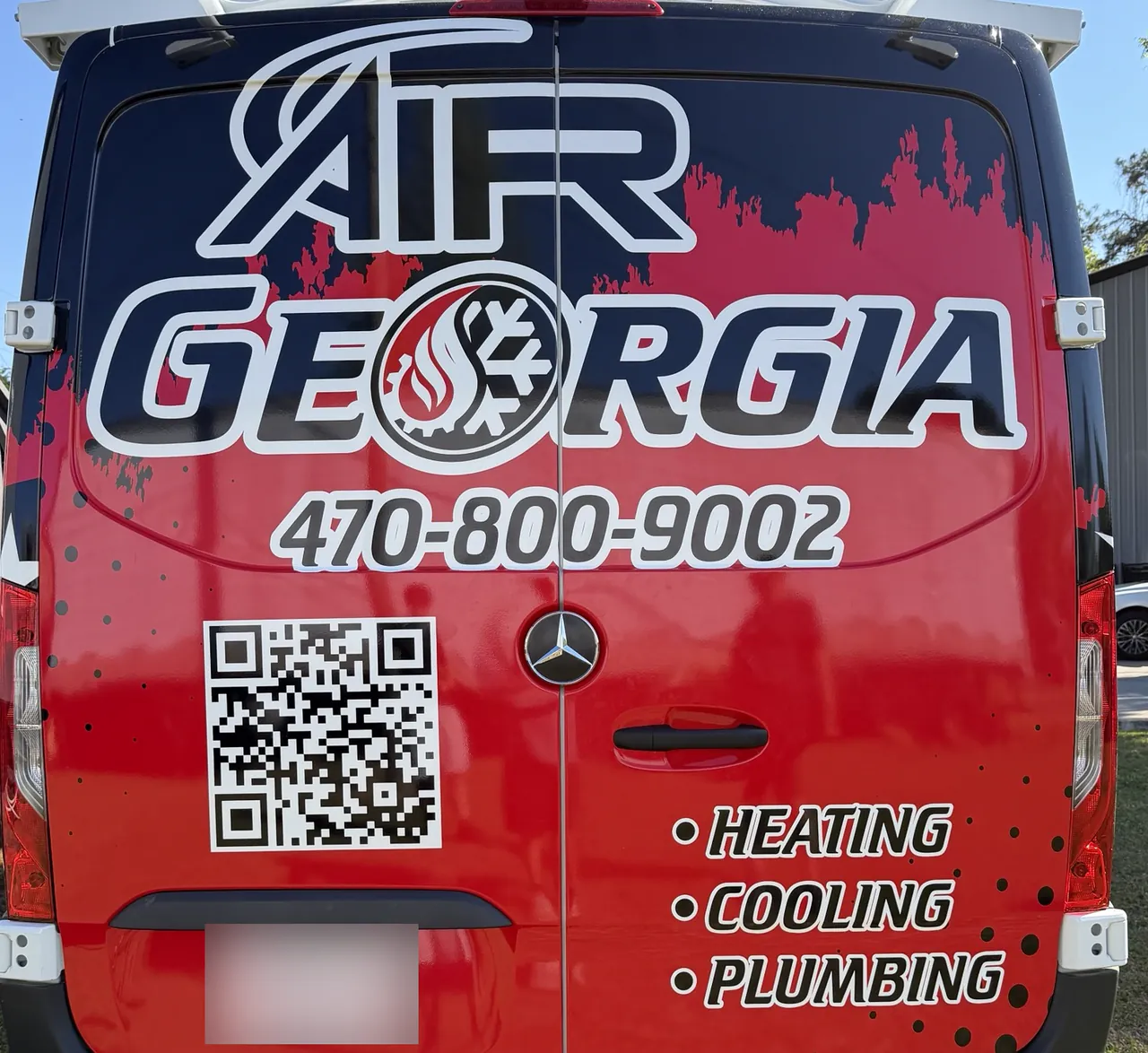 Close-up of the Air Georgia rear-door graphics
